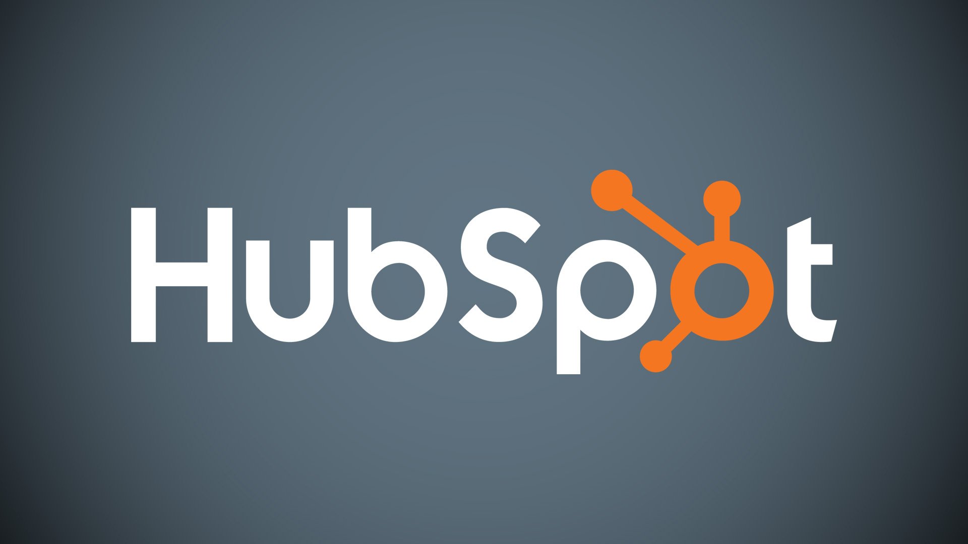 The words Hubspot on a dard background with the orange Hubspot Logo in place of the O.